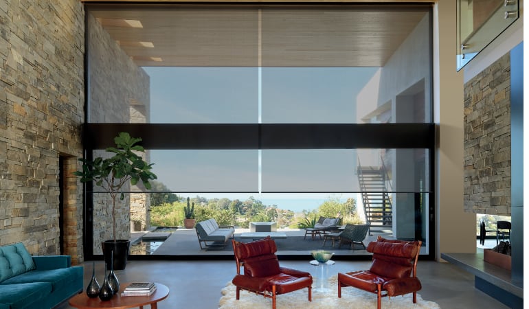 Motorized shades in a Southern California family room.